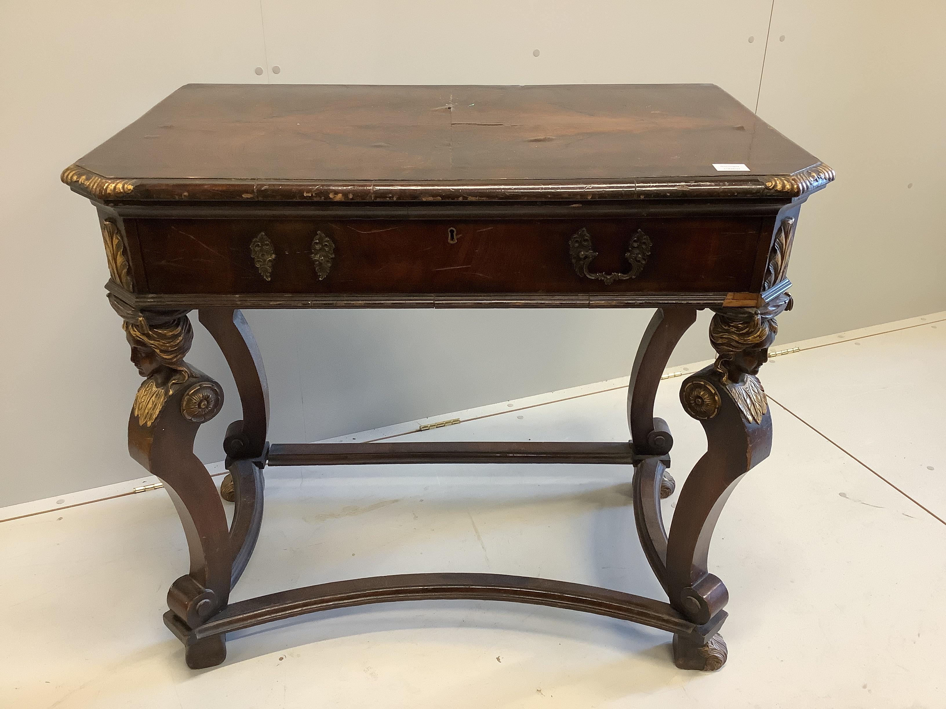 A Dutch parcel gilt banded walnut console table, fitted one long drawer, with mask and leaf carved legs, width 100cm, depth 61cm, height 89cm